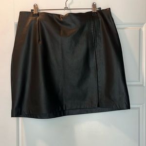 Faux leather mini skirt with slit. Dynamite. Size Large. Like new.